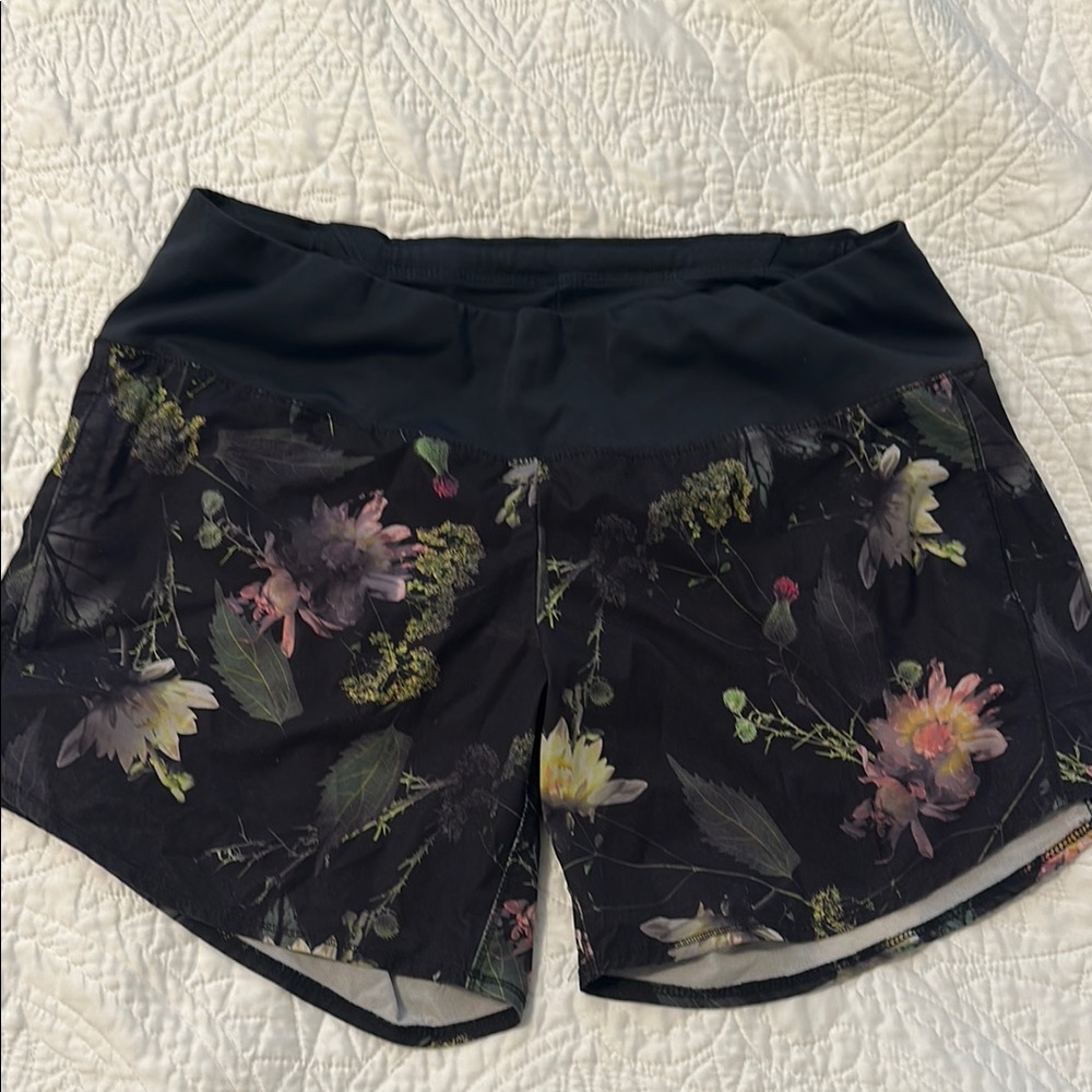 Oiselle Long Roga shorts (6 inch inseam). Floral pattern, size 8